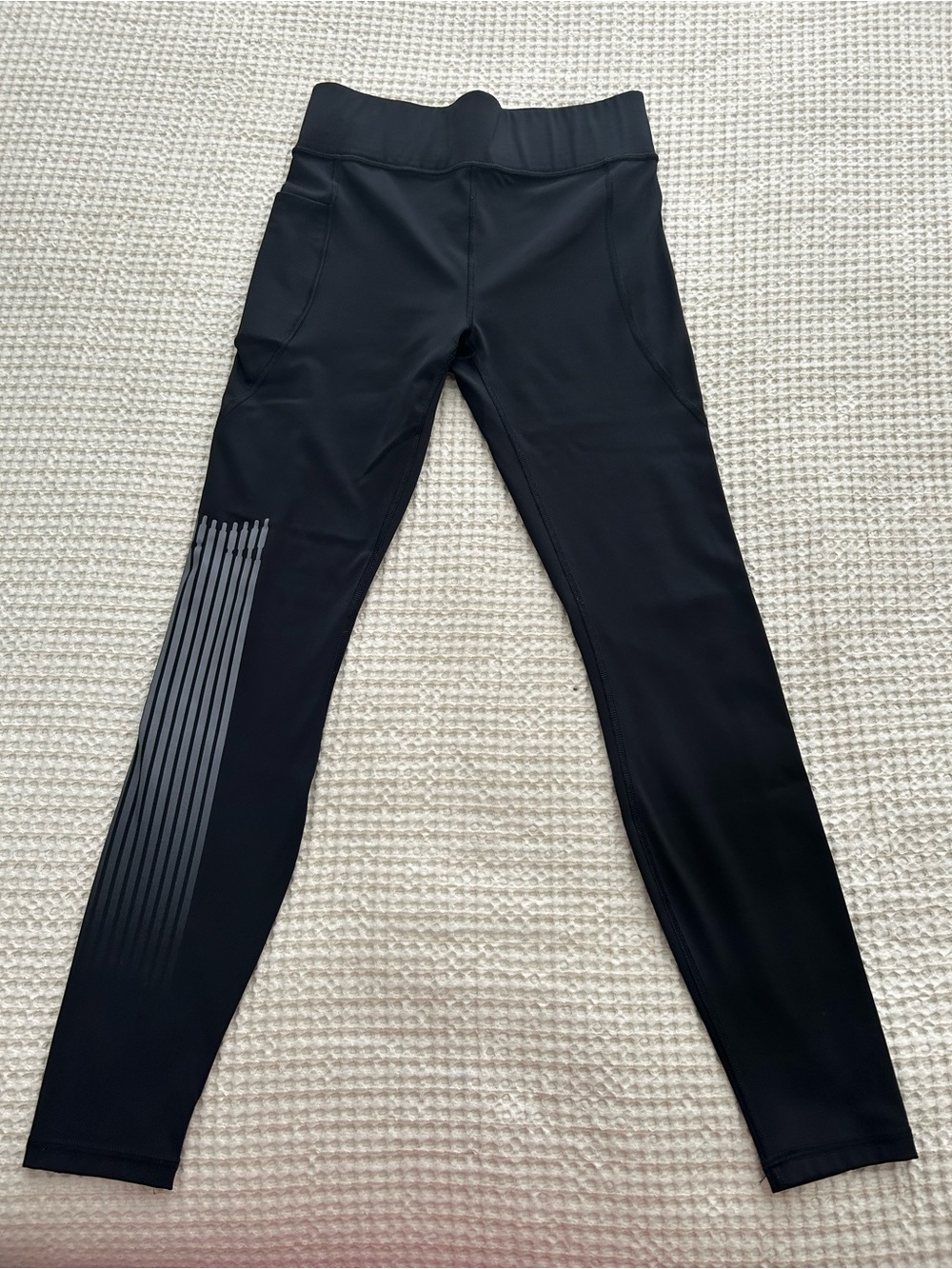 Rihanna’s Savage X Fenty Black High-Waist Leggings with Gray Stripe Panel